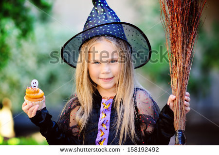 stock photo little girl wearing witch costume eat cupcake on halloween 158192492
